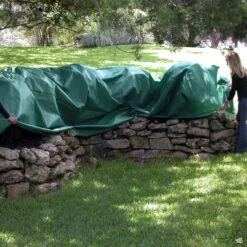 The Planket®Kit With Stakes 9 The Planket®Kit With Stakes -Eco Plant Works Planket Action2 4679bcd1 ed7b 440f a795 379057a57ebe